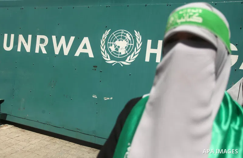 Palestinian women take part in a protest against possible reductions of the services and aid offered by United Nations Relief and Works Agency (UNRWA), in front of UNRWA headquarters in Gaza City August 16, 2015. Photo b...