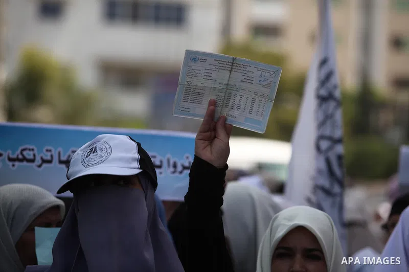 Palestinian women take part in a protest against possible reductions of the services and aid offered by United Nations Relief and Works Agency (UNRWA), in front of UNRWA headquarters in Gaza City August 16, 2015. Photo b...