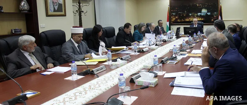 Palestinian Prime Minister Rami Hamdallah chairs a meeting of Council of Ministers in the West Bank city of Ramallah on August 18, 2015. Photo by Prime Minister Office