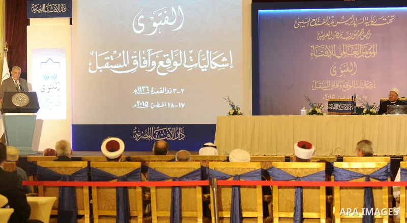 Egypt's Prime Minister Ibrahim Mahlab attends the Fatwa conference organised by Dar al-Ifta, in cairo on August 18, 2015. Egypt's Dar al-Ifta held a two-day international Fatwa conference to counter radical extremism ent...