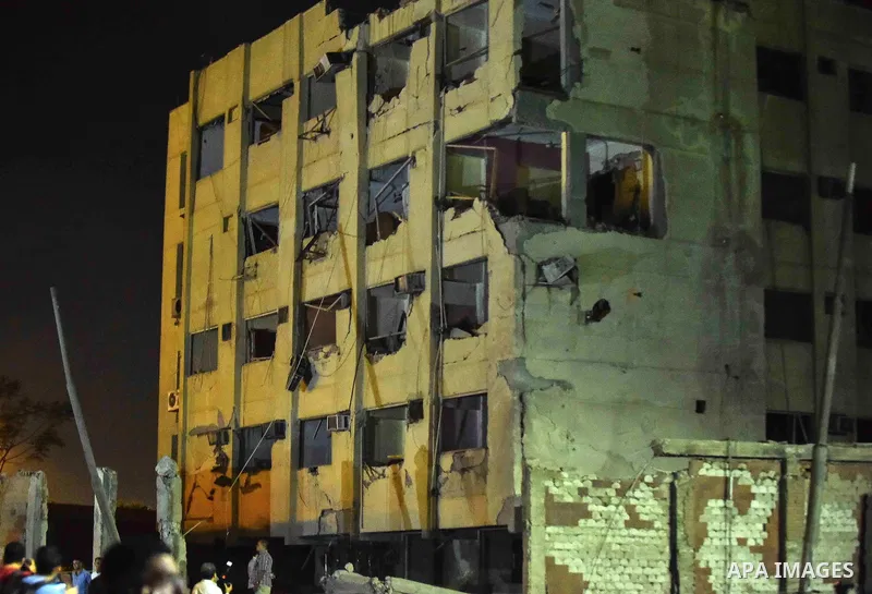 A national security building is badly damaged in a bomb blast in Shubra El-Kheima, Qaliubiya Governorate, on the outskirts of Cairo, Egypt August 20, 2015. At least six people were wounded early on Thursday in the car bo...