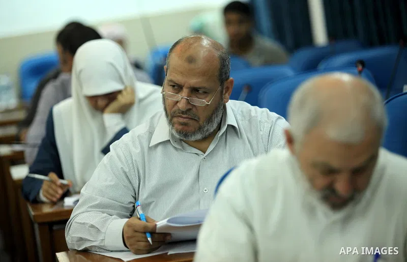 Members of the Palestinian legislative council from Hamas movement attend a meeting at the legislative council in Gaza city on August 20, 2015. Photo by Ashraf Amra