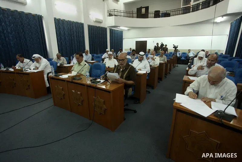 Members of the Palestinian legislative council from Hamas movement attend a meeting at the legislative council in Gaza city on August 20, 2015. Photo by Ashraf Amra