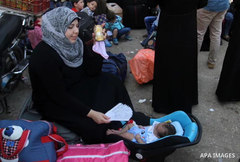 Palestinians gather at the Rafah border crossing in the southern Gaza Strip as they wait for permission to enter Egypt on August 20, 2015. Gunmen in Egypt boarded a bus carrying Palestinians from Cairo to Gaza and seized...