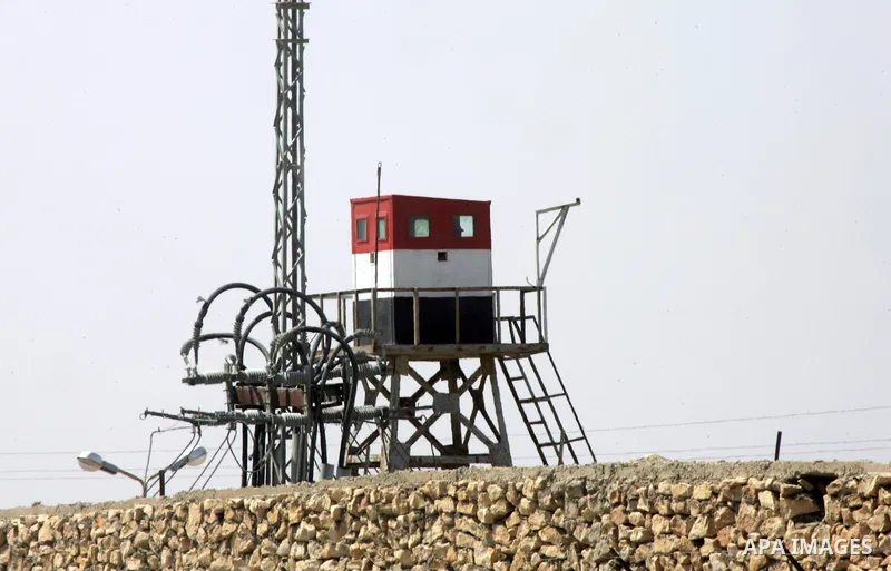 An Egyptian soldier stand on a watching tower at the border between Egypt and the southern Gaza Strip, August 20, 2015. Gunmen in Egypt boarded a bus carrying Palestinians from Cairo to Gaza and seized four of the passen...