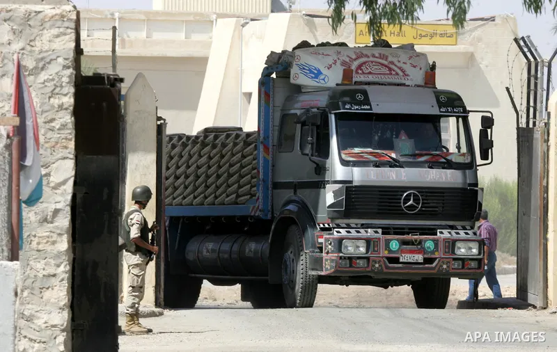 A truck loded with cement enters from Egypt through the Rafah border crossing in southern Gaza Strip, August 20, 2015. The authorities in Egypt have allowed 1,000 tons of cement and 166 tons of gravel to cross the border...