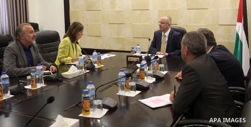 Palestinian Prime Minister Rami Hamdallah meets with ILO expert in Social Security, Ms. Ursula Kolekih, in the West Bank city of Ramallah on August 23, 2015. Photo by Prime Minister Office