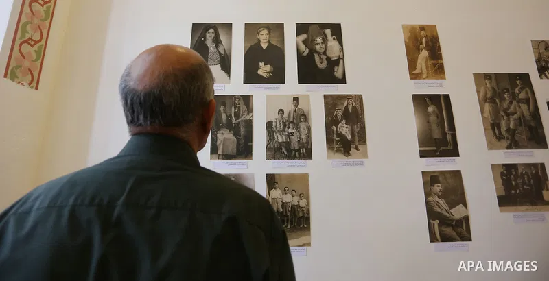 Palestinians take part in an exhibition for the Palestinian heritage, in the West Bank city of Ramallah, on August 24, 2015. Photo by Shadi Hatem