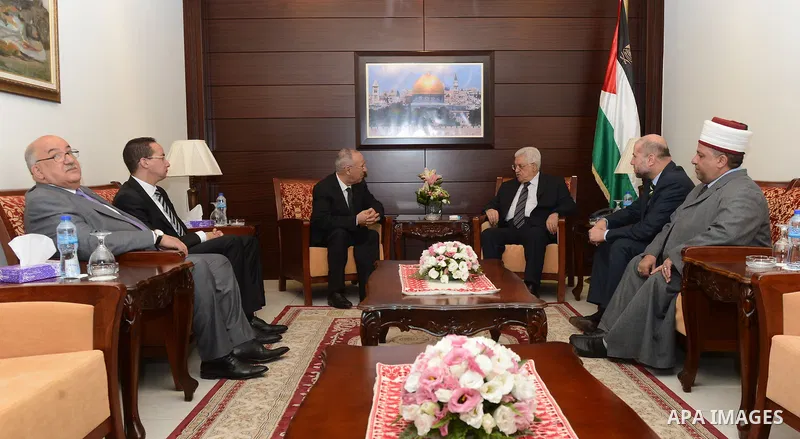 Palestinian President, Mahmoud Abbas (Abu Mazen) meets with Minister of Awqaf and Islamic Affairs of Morocco, in the West Bank city of Ramallah on August 24, 2015. Photo by Osama Falah