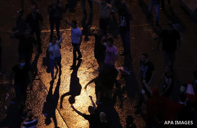 Lebanese protesters take part in a demonstration, organized by "You Stink" campaign, to protest against the ongoing country's trash crisis in the capital Beirut on August 23, 2015. Demonstrators clashed with police in Be...