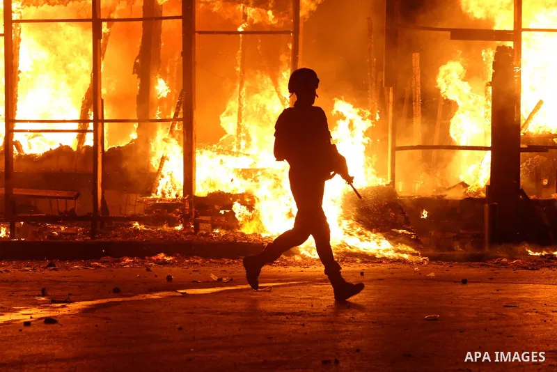 Army soldiers patrol the streets in Beirut as protestors demand the Lebanese government resign over its failure to remove uncollected rubbish from the streets on August 23, 2015. Demonstrators clashed with police in Beir...