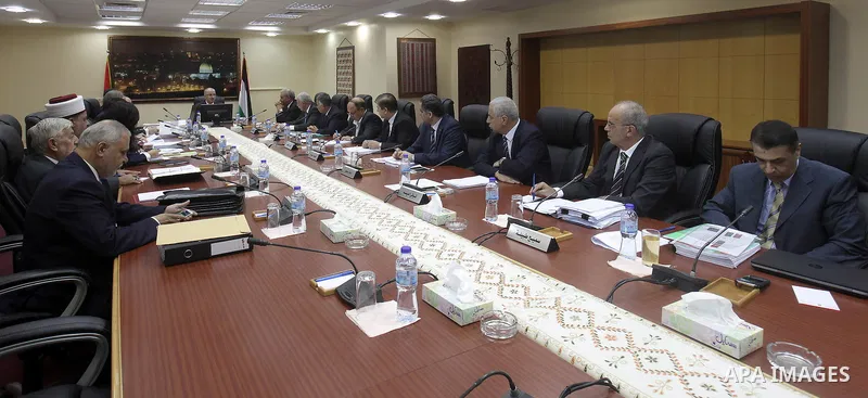 Palestinian Prime Minister Rami Hamdallah chairs a meeting of the council of ministers in the West Bank city of Ramallah, on August 25, 2015. Photo by Prime Minister Office