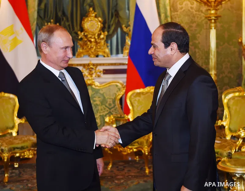 Egyptian President, Abdel Fattah al-Sisi shakes hands with Russian President Vladimir Putin, in the Kremlin in Moscow, Aug. 26, 2015. The Egyptian president is visiting Moscow in a bid to revive relations with Russia whi...