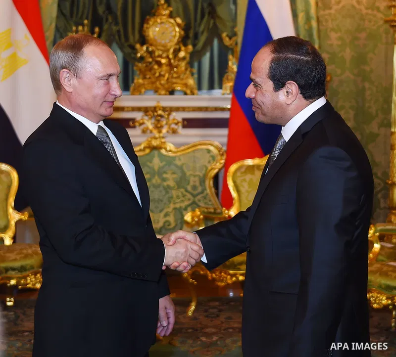 Egyptian President, Abdel Fattah al-Sisi shakes hands with Russian President Vladimir Putin, in the Kremlin in Moscow, Aug. 26, 2015. The Egyptian president is visiting Moscow in a bid to revive relations with Russia whi...