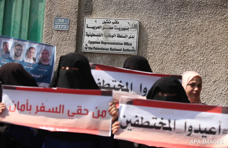 Families of Palestinians who were abducted of by gunmen is Egypt's Sinai's northern region, take part in a demonstration calling for the release in front of the Egyptian embassy, in Gaza city on August 27, 2015. Gunmen i...