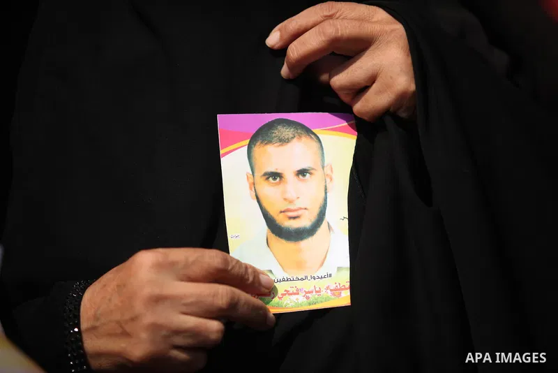 Families of Palestinians who were abducted of by gunmen is Egypt's Sinai's northern region, take part in a demonstration calling for the release in front of the Egyptian embassy, in Gaza city on August 27, 2015. Gunmen i...