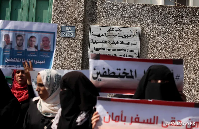 Families of Palestinians who were abducted of by gunmen is Egypt's Sinai's northern region, take part in a demonstration calling for the release in front of the Egyptian embassy, in Gaza city on August 27, 2015. Gunmen i...