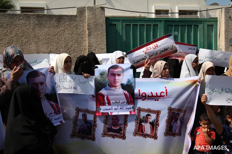 Families of Palestinians who were abducted of by gunmen is Egypt's Sinai's northern region, take part in a demonstration calling for the release in front of the Egyptian embassy, in Gaza city on August 27, 2015. Gunmen i...