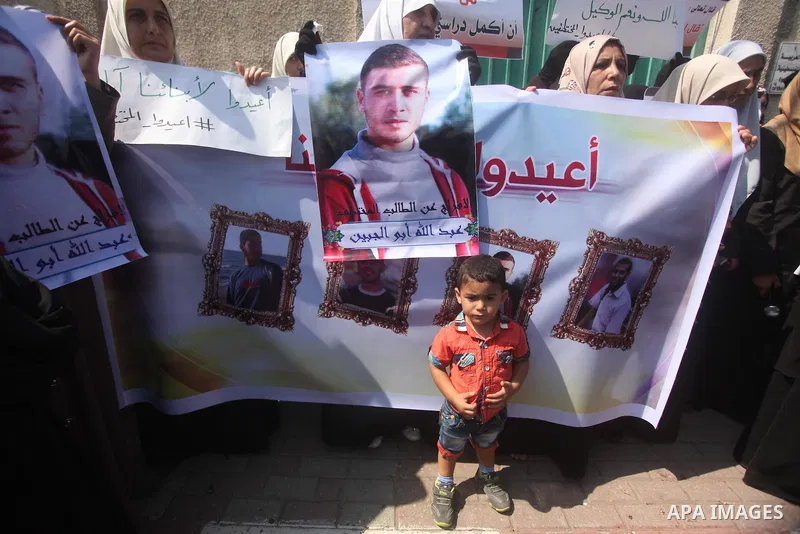 Families of Palestinians who were abducted of by gunmen is Egypt's Sinai's northern region, take part in a demonstration calling for the release in front of the Egyptian embassy, in Gaza city on August 27, 2015. Gunmen i...