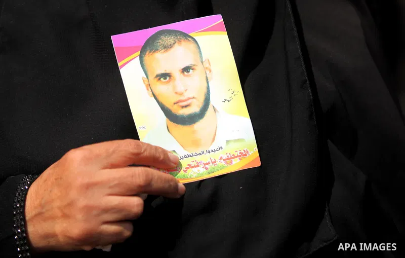 Families of Palestinians who were abducted of by gunmen is Egypt's Sinai's northern region, take part in a demonstration calling for the release in front of the Egyptian embassy, in Gaza city on August 27, 2015. Gunmen i...
