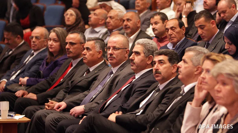 Palestinian Prime Minister Rami Hamdallah participates in the second forum of community accountability in Palestine, in the West Bank city of Ramallah on August 27, 2015. Photo by Prime Minister Office
