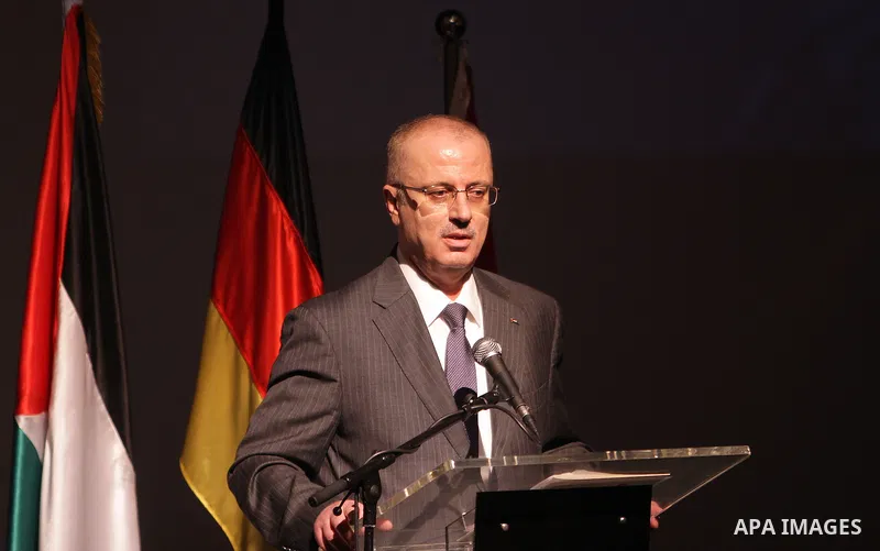 Palestinian Prime Minister Rami Hamdallah participates in the second forum of community accountability in Palestine, in the West Bank city of Ramallah on August 27, 2015. Photo by Prime Minister Office