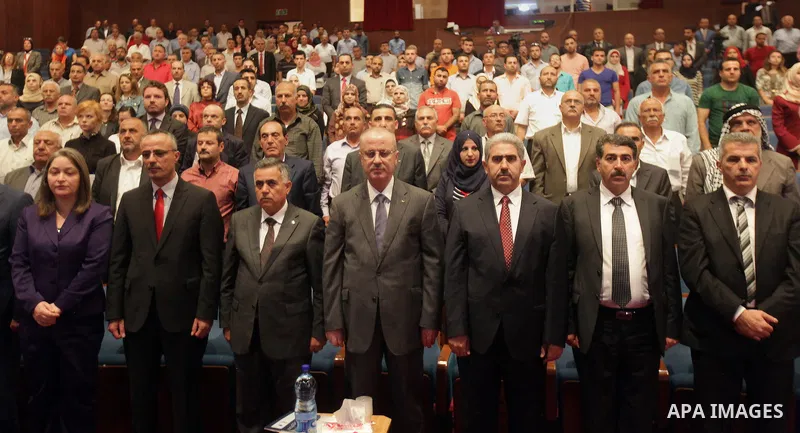 Palestinian Prime Minister Rami Hamdallah participates in the second forum of community accountability in Palestine, in the West Bank city of Ramallah on August 27, 2015. Photo by Prime Minister Office