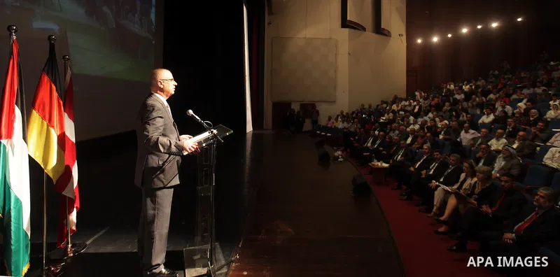 Palestinian Prime Minister Rami Hamdallah participates in the second forum of community accountability in Palestine, in the West Bank city of Ramallah on August 27, 2015. Photo by Prime Minister Office