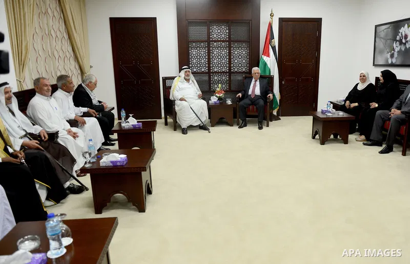Palestinian President Mahmoud Abbas meets with a delegation of Gaza Strip's notables, at his headquarter in the West Bank city of Ramallah, August 28, 2015. Photo by Osama Falah