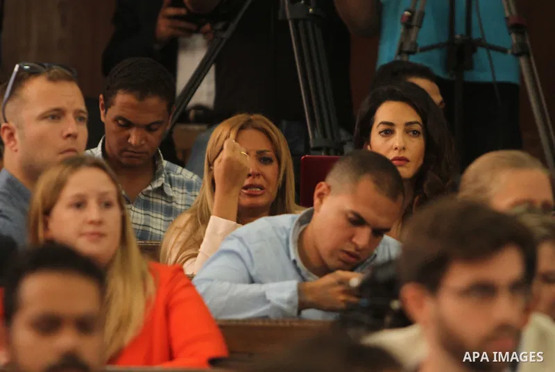 Marwa Omara, wife of Al Jazeera television journalist Mohamed Fahmy, reacts at a court in Cairo, Egypt, August 29, 2015. An Egyptian court sentenced three Al Jazeera TV journalists to three years in prison on Saturday fo...