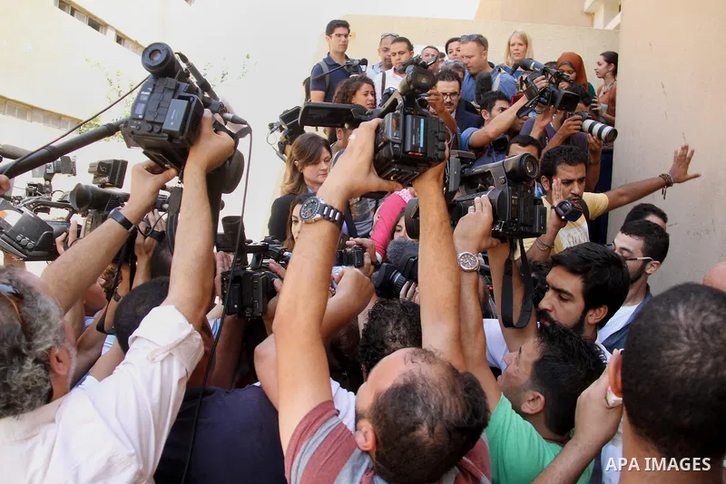 Al Jazeera television journalist Mohamed Fahmy's lawyer Amal Clooney talks to the media after the verdict outside a court in Cairo, Egypt, August 29, 2015. An Egyptian court sentenced three Al Jazeera TV journalists to t...