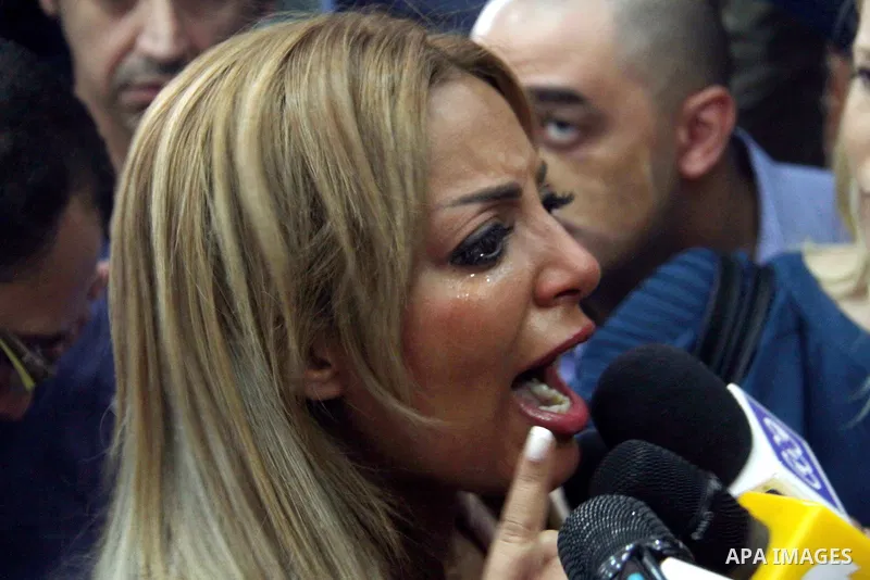 Marwa Omara, wife of Al Jazeera television journalist Mohamed Fahmy, talks to the media after the verdict at a court in Cairo, Egypt, August 29, 2015. An Egyptian court sentenced three Al Jazeera TV journalists to three...