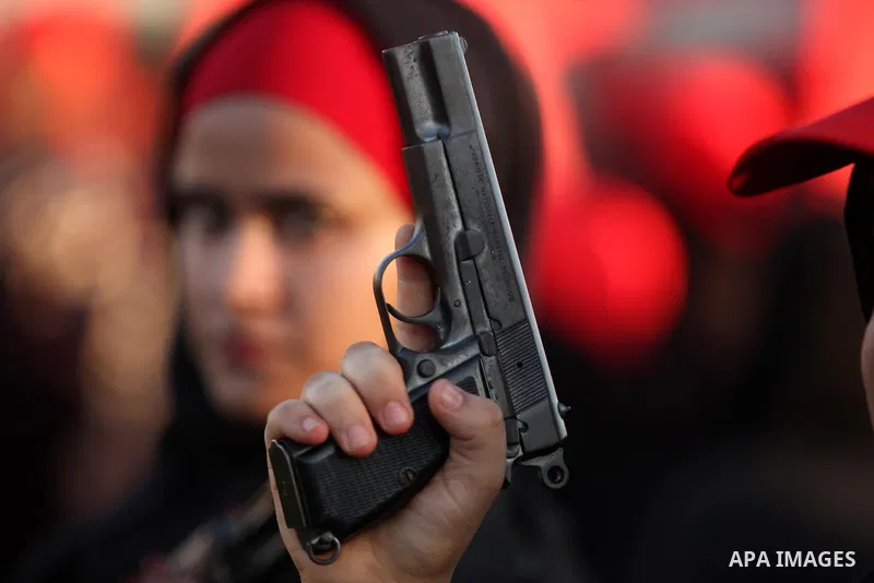 Palestinian girls participate in a military graduation ceremony of the Popular Front for the Liberation of Palestine (PFLP), in Gaza city on August 29, 2015. Photo by Ashraf Amra