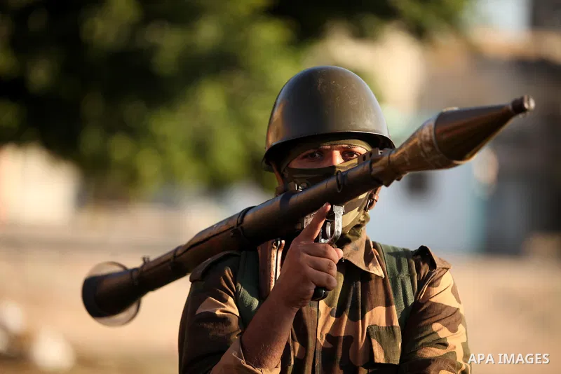 Palestinian youths participate in a military graduation ceremony of the Popular Front for the Liberation of Palestine (PFLP), in Gaza city on August 29, 2015. Photo by Ashraf Amra