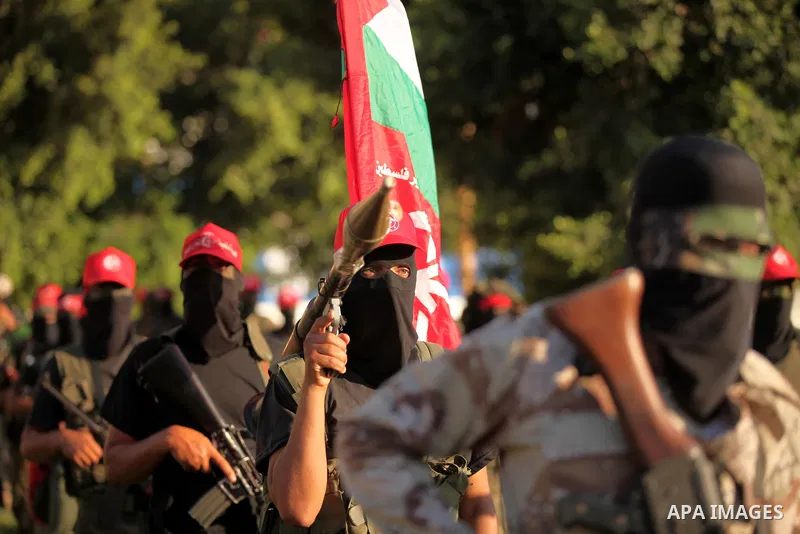 Palestinian youths participate in a military graduation ceremony of the Popular Front for the Liberation of Palestine (PFLP), in Gaza city on August 29, 2015. Photo by Ashraf Amra