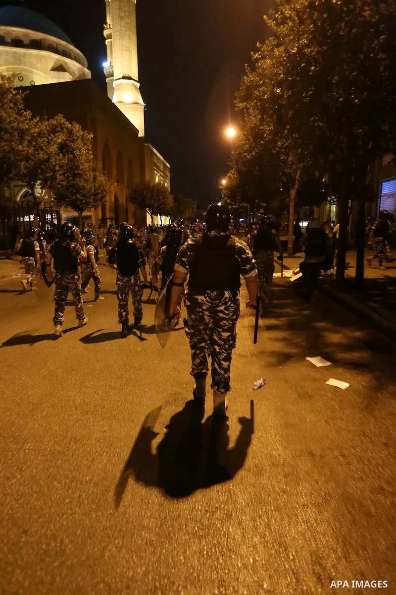 Lebanese policemen stand guard after dispersing a demonstration against the anti-government at Martyrs' Square in downtown Beirut, Lebanon August 29, 2015. Thousands of protesters waving Lebanese flags and chanting "revo...