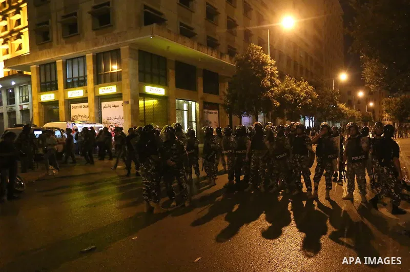 Lebanese policemen stand guard after dispersing a demonstration against the anti-government at Martyrs' Square in downtown Beirut, Lebanon August 29, 2015. Thousands of protesters waving Lebanese flags and chanting "revo...