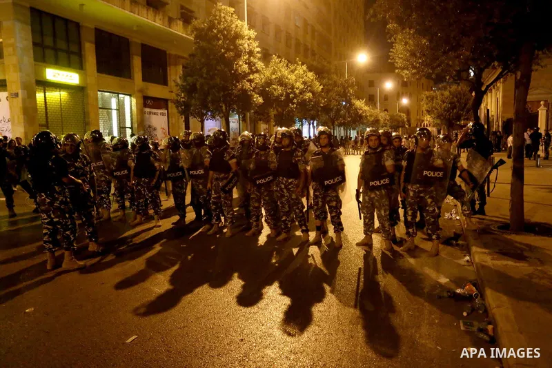 Lebanese policemen stand guard after dispersing a demonstration against the anti-government at Martyrs' Square in downtown Beirut, Lebanon August 29, 2015. Thousands of protesters waving Lebanese flags and chanting "revo...