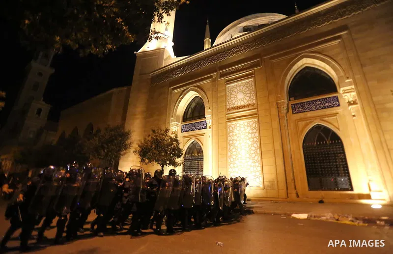 Lebanese policemen stand guard after dispersing a demonstration against the anti-government at Martyrs' Square in downtown Beirut, Lebanon August 29, 2015. Thousands of protesters waving Lebanese flags and chanting "revo...