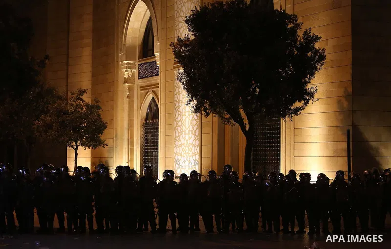 Lebanese policemen stand guard after dispersing a demonstration against the anti-government at Martyrs' Square in downtown Beirut, Lebanon August 29, 2015. Thousands of protesters waving Lebanese flags and chanting "revo...