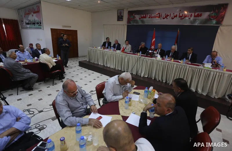 Turkish ambassador to the Palestinian Authority Mustafa Sarnch, attend a meeting with Palestinian businessmen, in Gaza city, on August 30, 2015. Photo by Mohammed Asad