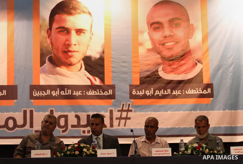 Palestinian leaders attend a meeting about the Palestinians who were abducted of by gunmen is Egypt's Sinai's northern region in Gaza city on August 30, 2015. Gunmen in Egypt boarded a bus carrying Palestinians from Cair...