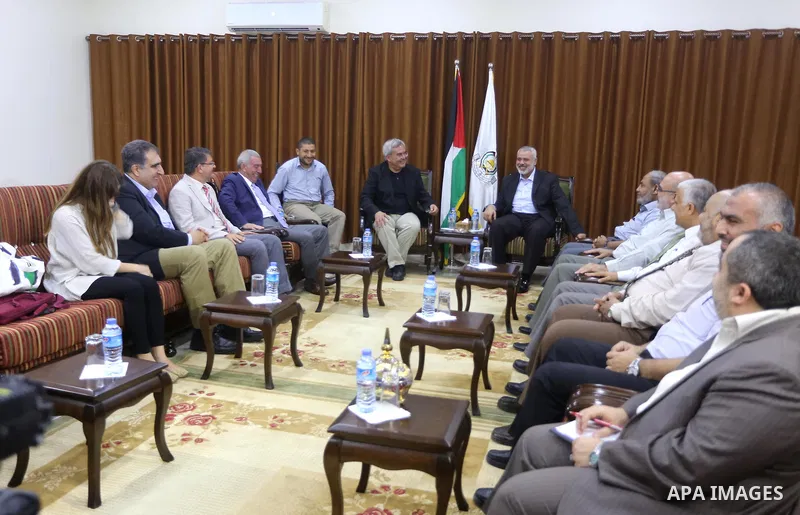 Senior Hamas leader Ismail Haniyeh, meets with Turkish ambassador to the Palestinian Authority Mustafa, in Gaza city on August 30, 2015. Photo by Mohammed Asad