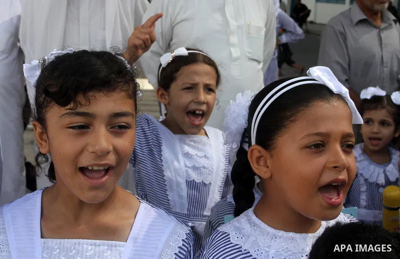 Palestinian pupils take part in a protest against the reduction of educational programs given by the United Nations Relief and Works Agency (UNRWA) and the growing number of students per class due to lack of funds in the...