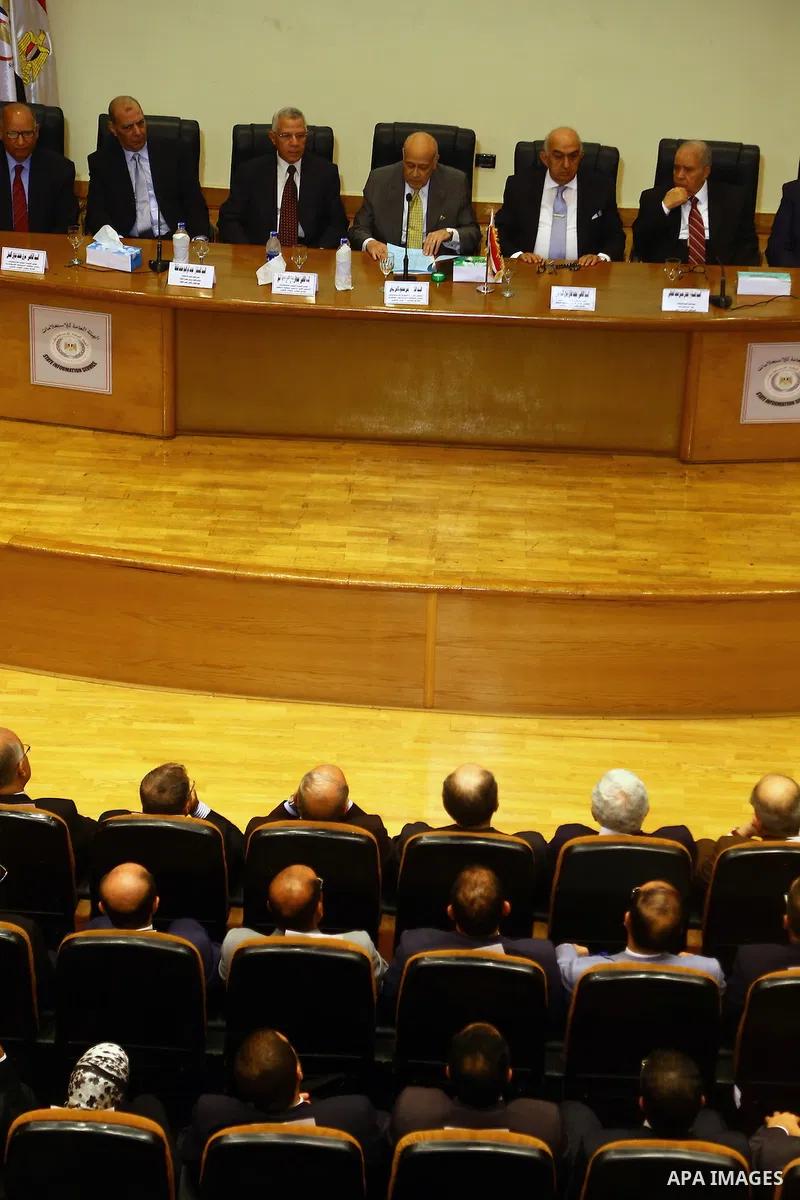Members of the High Elections Committee attend a news conference in Cairo, Egypt, August 30, 2015. Egypt will hold a long-awaited parliamentary election in two phases starting Oct. 18-19, the election commission said on...