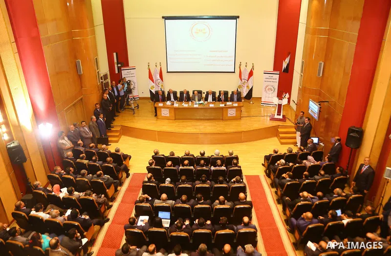 Members of the High Elections Committee attend a news conference in Cairo, Egypt, August 30, 2015. Egypt will hold a long-awaited parliamentary election in two phases starting Oct. 18-19, the election commission said on...
