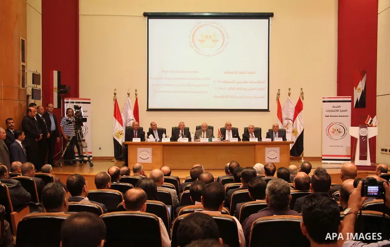 Members of the High Elections Committee attend a news conference in Cairo, Egypt, August 30, 2015. Egypt will hold a long-awaited parliamentary election in two phases starting Oct. 18-19, the election commission said on...