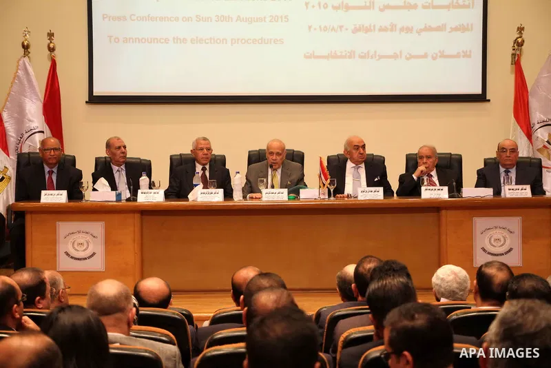 Members of the High Elections Committee attend a news conference in Cairo, Egypt, August 30, 2015. Egypt will hold a long-awaited parliamentary election in two phases starting Oct. 18-19, the election commission said on...