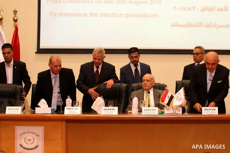Members of the High Elections Committee attend a news conference in Cairo, Egypt, August 30, 2015. Egypt will hold a long-awaited parliamentary election in two phases starting Oct. 18-19, the election commission said on...