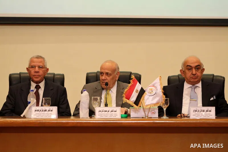 Members of the High Elections Committee attend a news conference in Cairo, Egypt, August 30, 2015. Egypt will hold a long-awaited parliamentary election in two phases starting Oct. 18-19, the election commission said on...